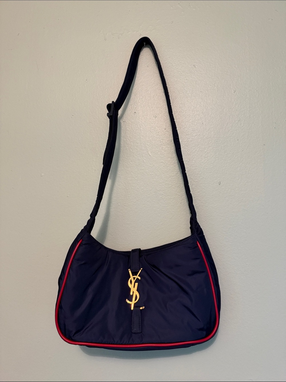 Yves Saint Laurent Navy Shoulder Bag with Red Piping and Gold Logo